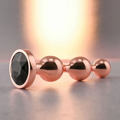 Gender X GOLD DIGGER SMALL -  Small Butt Plug with Black Gem Base